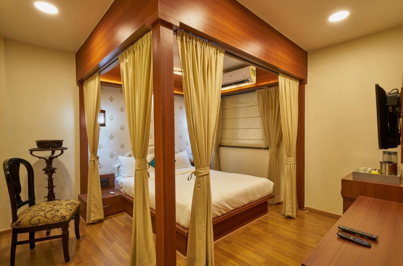 Tranquil La Casa Hotel Pune Bilik gambar
